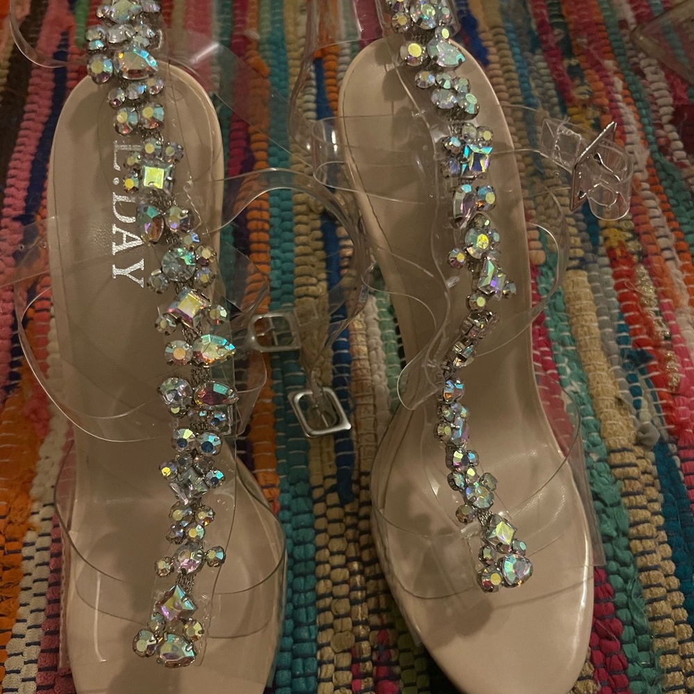 Beautiful nude in iridescent heels